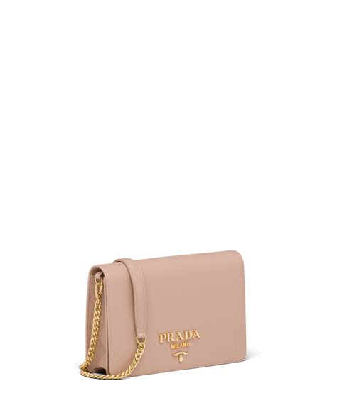 prada saffiano leather mini bag in powder pink